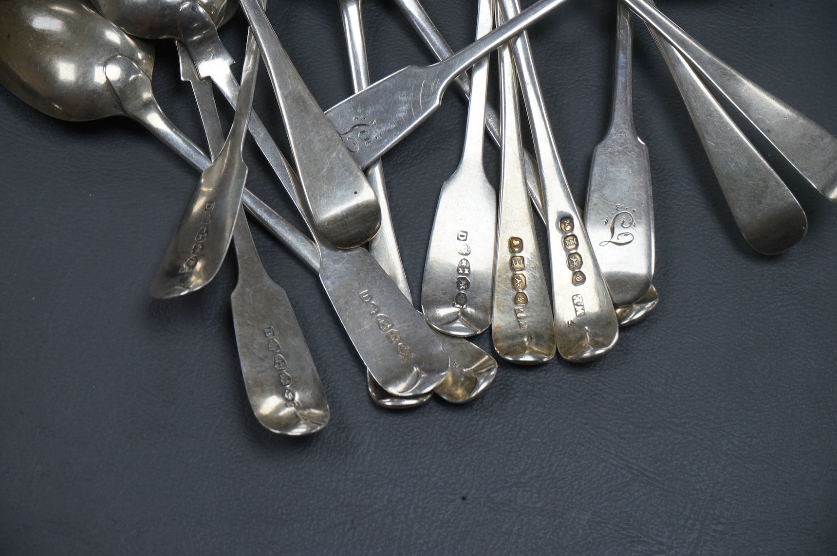 A set of eight George IV silver Old English pattern teaspoons, William Eaton, London 1827, 14.2cm, together with a set of six early Victorian provincial silver fiddle pattern teaspoons, by John Walton, Newcastle, 1842, 7